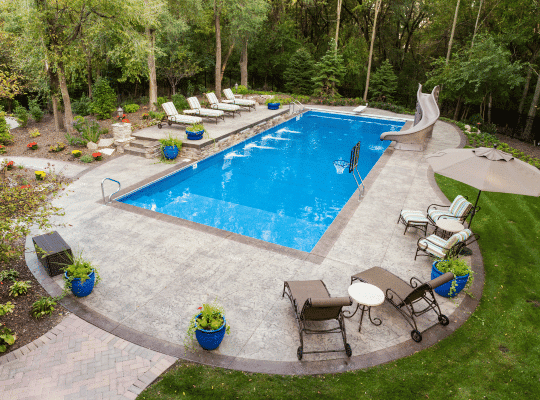 A stunning standard concrete pool designed and built by Preferred Concrete Tampa, showcasing exceptional craftsmanship and durability, ideal for Tampa's upscale residences.