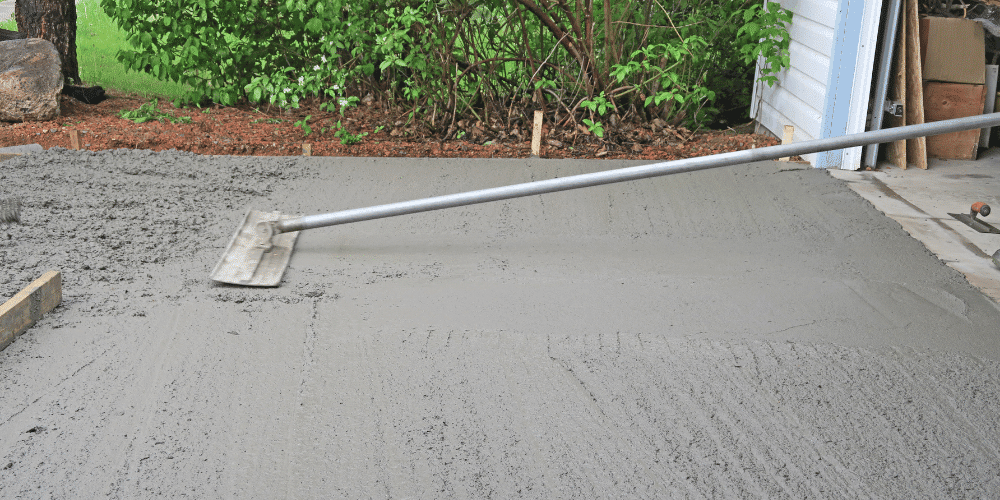 Preferred Concrete Tampa team crafting an exemplary concrete driveway, enhancing a Tampa home's curb appeal.